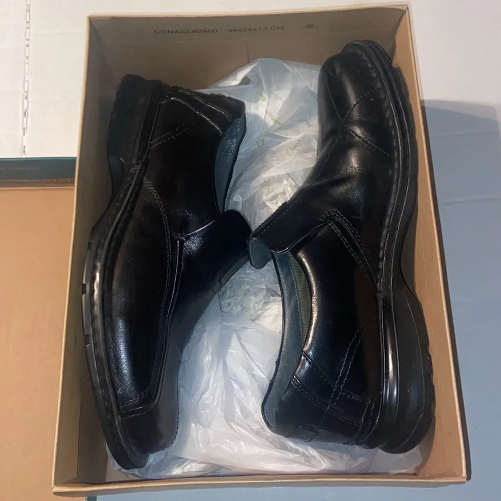 Clarks Escalate black slip on loafers size 10M with original box.